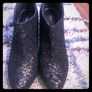 Black heeled sparkly boots